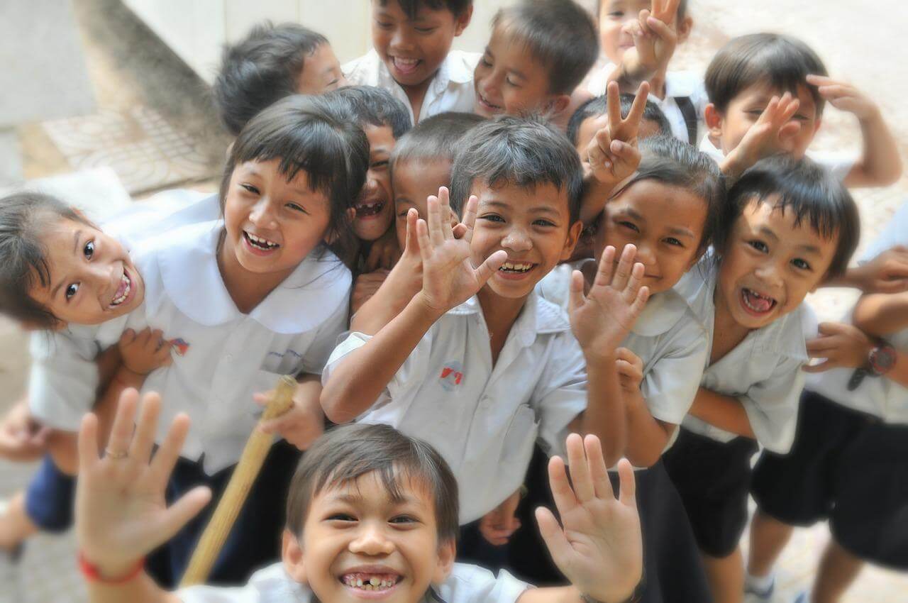 Children students cheering, smiling