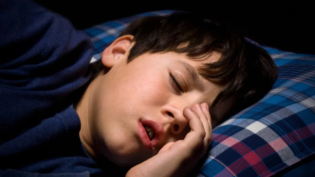 Boy with Autism sleeps